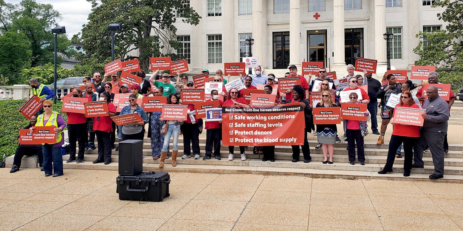 Workers rally against the American Red Cross. Photo credit: Omar Tewfik